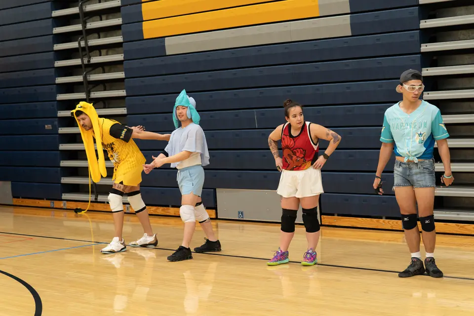 Halloween Tournament players together on the court
