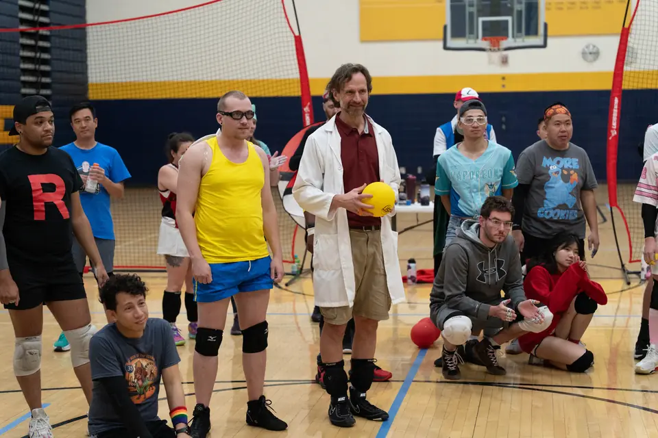 Halloween Tournament players together on the court