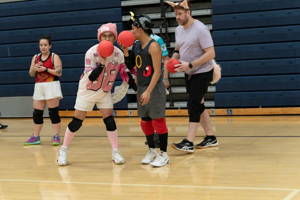 Halloween Tournament players together on the court