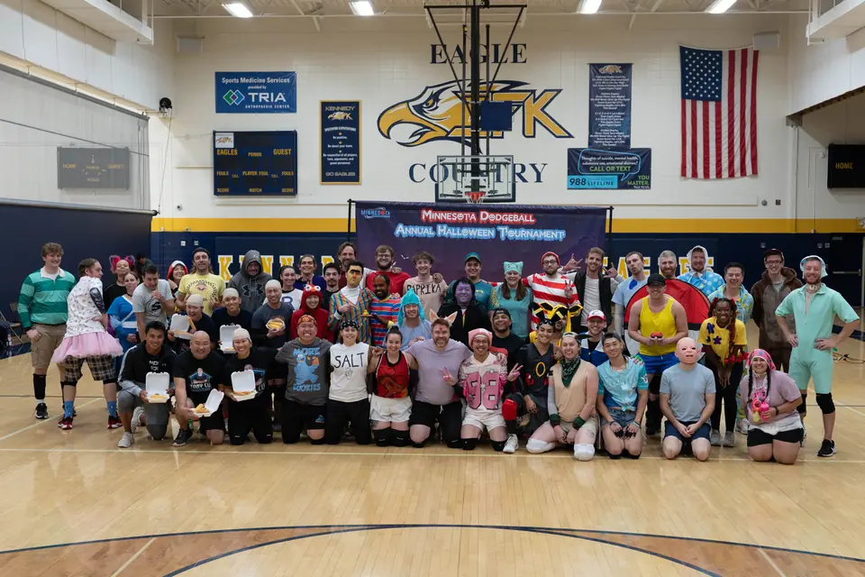 Halloween Tournament players together on the court