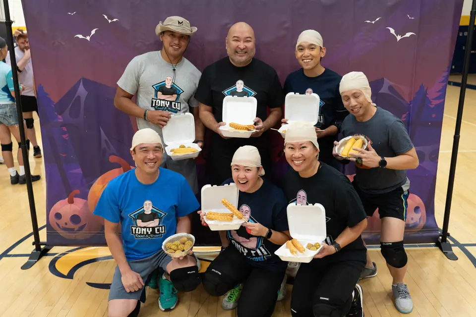Halloween Tournament players together on the court