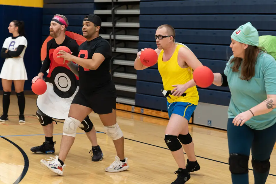 Halloween Tournament players together on the court