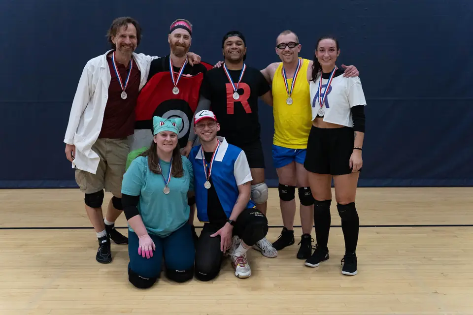 Halloween Tournament players together on the court